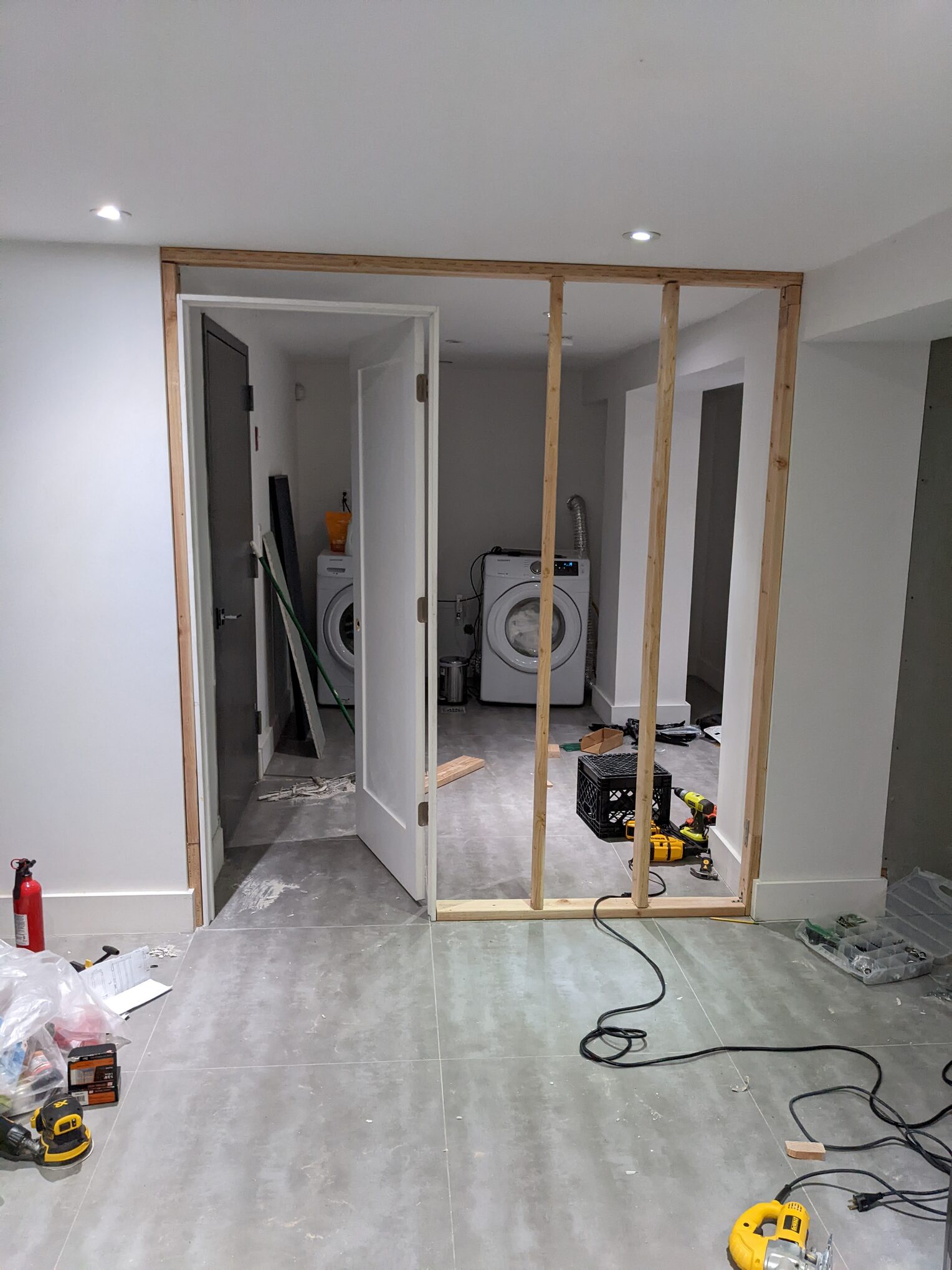 A home interior with a newly framed wall